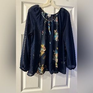 Cupio sheer long sleeve blouse is a size Large.